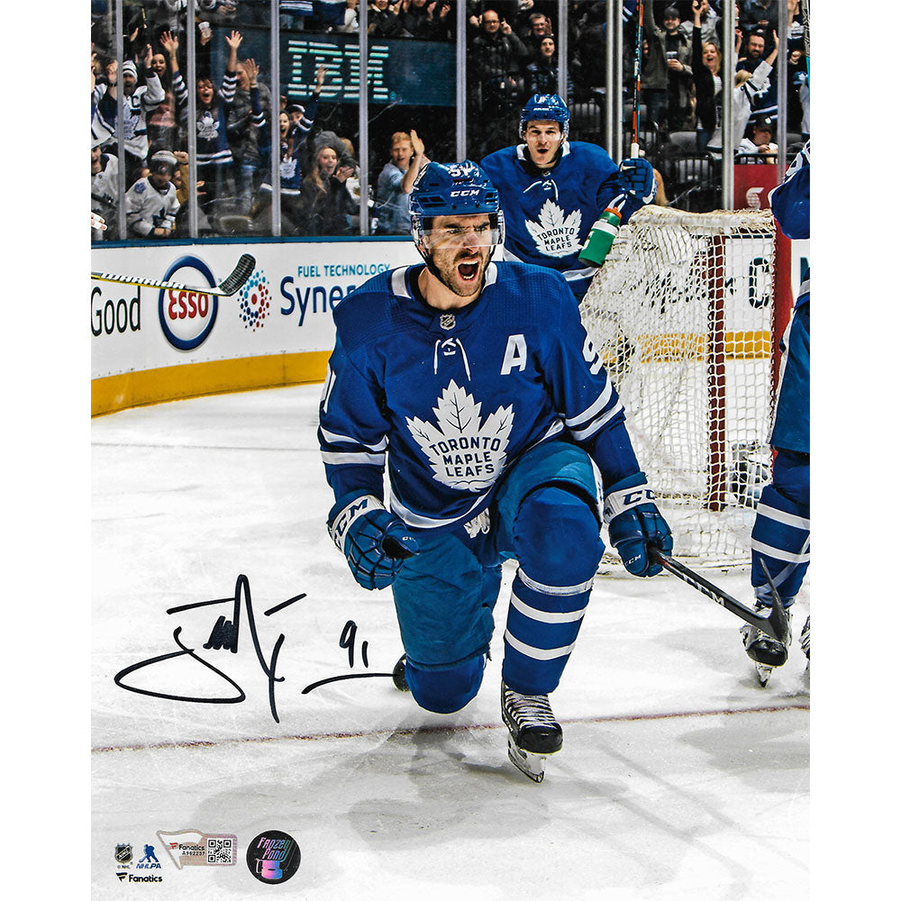 John Tavares Toronto Maple Leafs Unsigned Blue Reverse Retro Jersey Skating Photograph