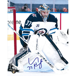 Connor Hellebuyck Autographed Winnipeg Jets 8X10 Photo (White Jersey)