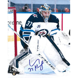 Connor Hellebuyck Autographed Winnipeg Jets 8X10 Photo (White Jersey)