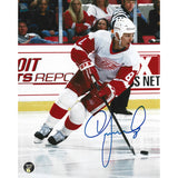 Igor Larionov Autographed Detroit Red Wings 8X10 Photo (w/puck)