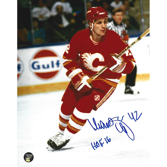 Sergei Makarov Autographed Calgary Flames 8X10 Photo (Red Jersey)