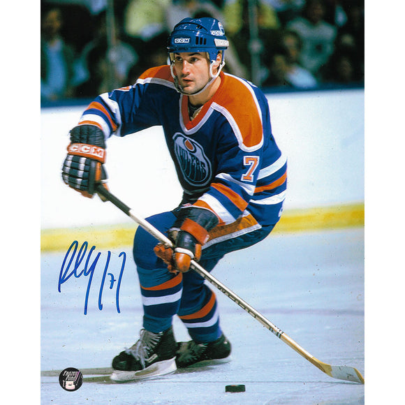 Paul Coffey Autographed Edmonton Oilers 8X10 Photo (w/puck)